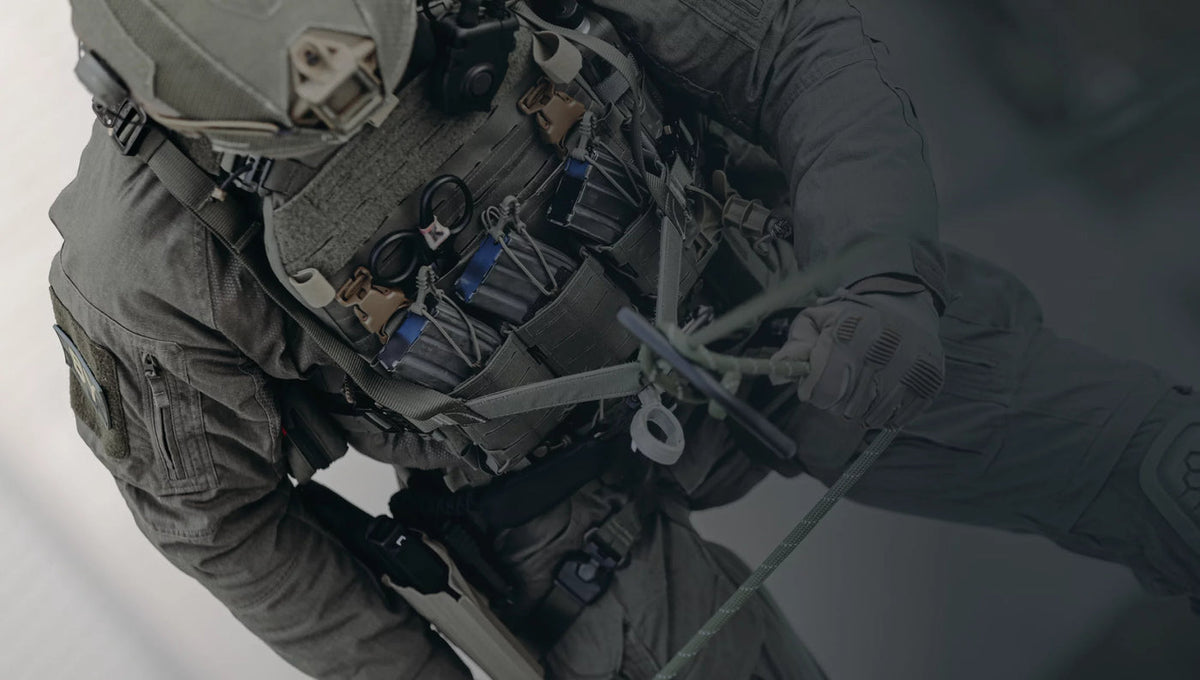 Lindnerhof tactical equipment worn with a plate carrier and magazine pouches.